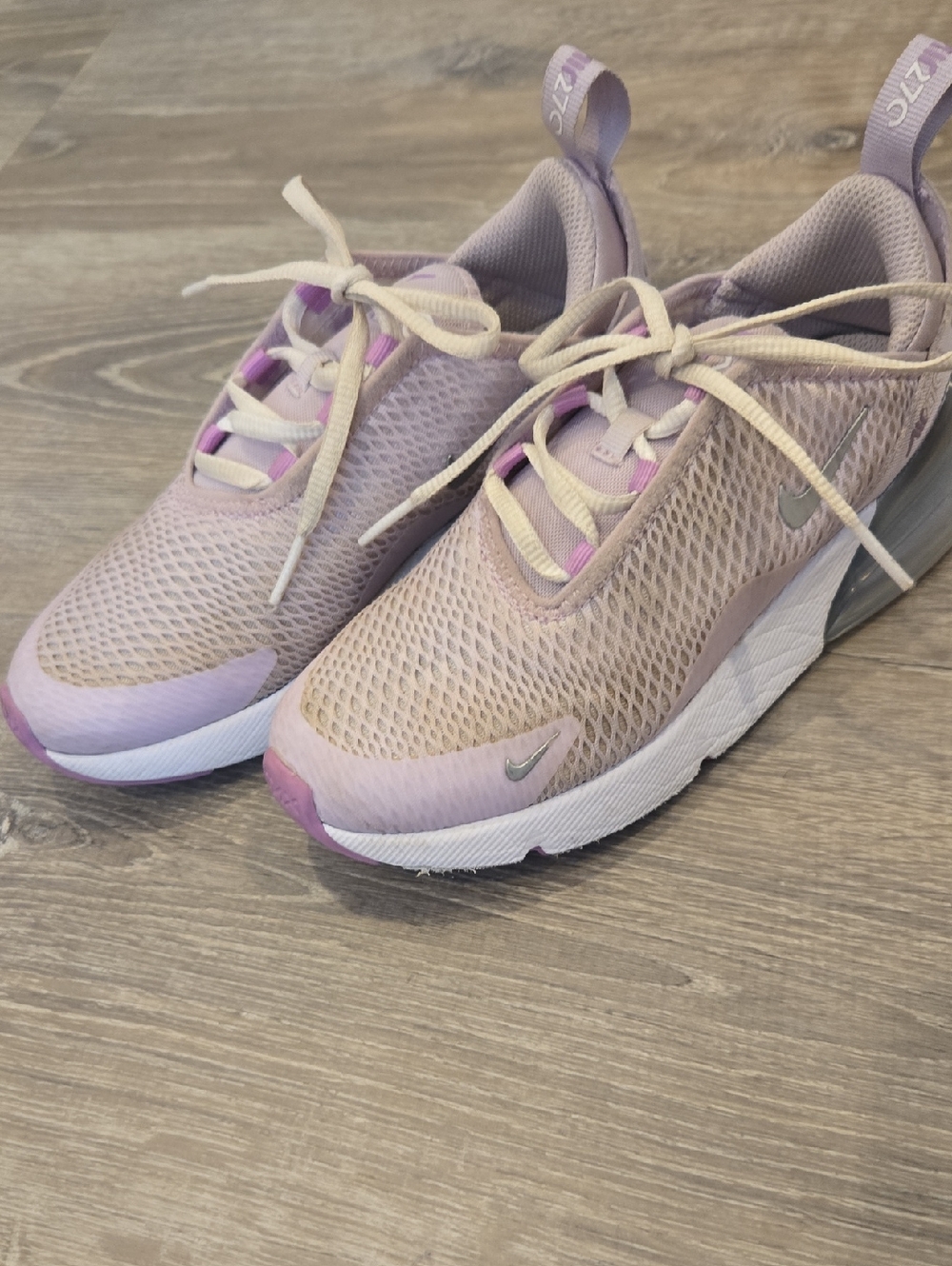 Nike's Kids Light Purple Mesh Sneakers with Silver Swoosh
